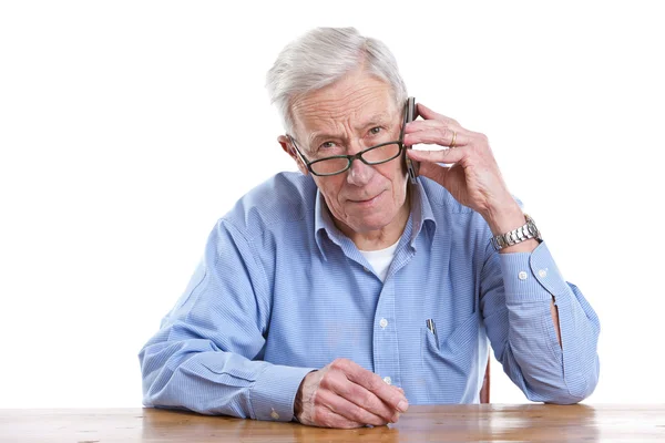 Senior aan de telefoon — Stockfoto