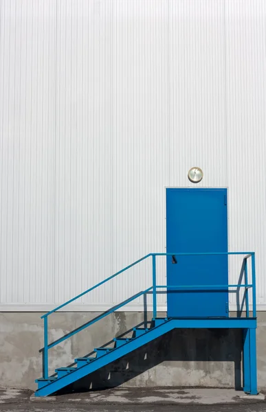 Stock image Blue door and stairs