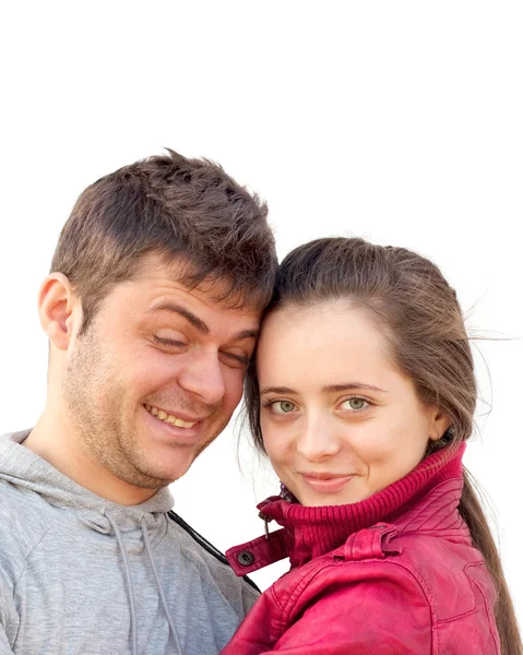 性格开朗的年轻夫妇抱着笑着白色背景的肖像 — 图库照片