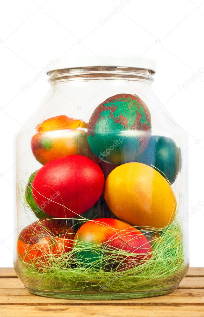 Easter concept.Colorful easter eggs in a jar