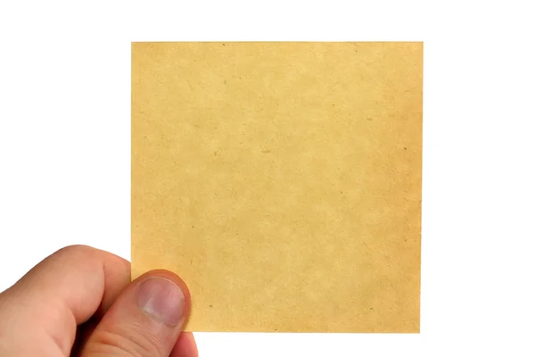 男人的手张空白的 黄色的纸 孤立的白色背景上 — 图库照片