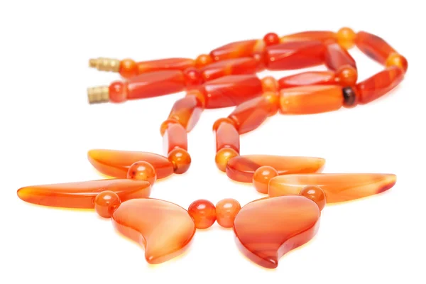 Perline di ambra rossastra isolate — Foto Stock