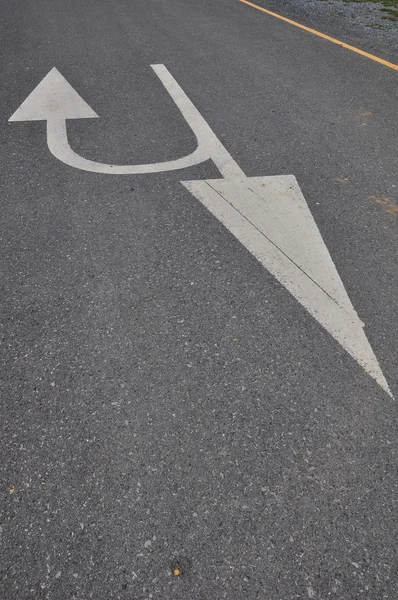 U-turn arrow on the road — Stock Photo, Image