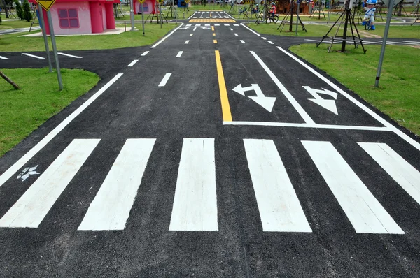 Zebra way on the asphalt road surface — Stock Photo, Image