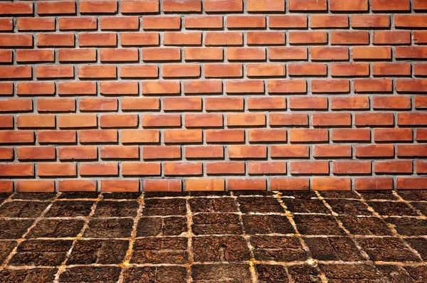 Brickwall et vieux motif de sol en pierre — Photo
