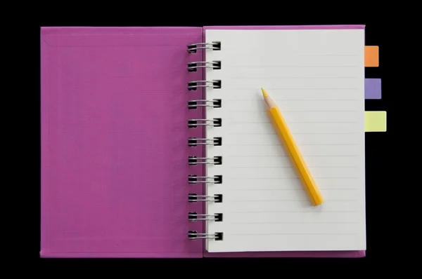 Klein notitieboekje en kleurrijke potlood — Stockfoto