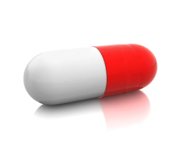 Comprimido vermelho único — Fotografia de Stock