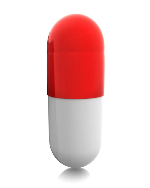 Czerwoną pigułkę stojący na białym tle — Zdjęcie stockowe