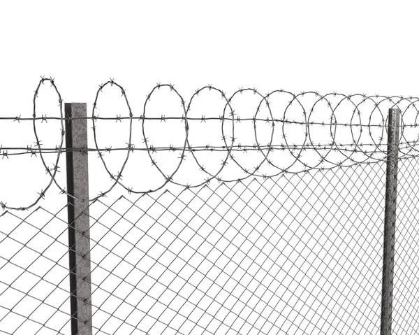 Забор с колючей проволокой сверху — стоковое фото