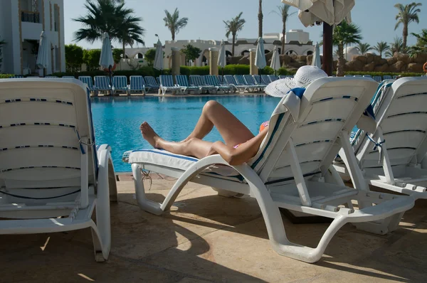 stock image Girl relaxing by pool