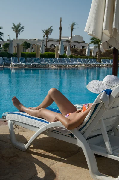 stock image Girl relaxing by pool