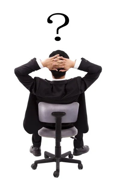 Empresário está pensando e ponto de interrogação — Fotografia de Stock