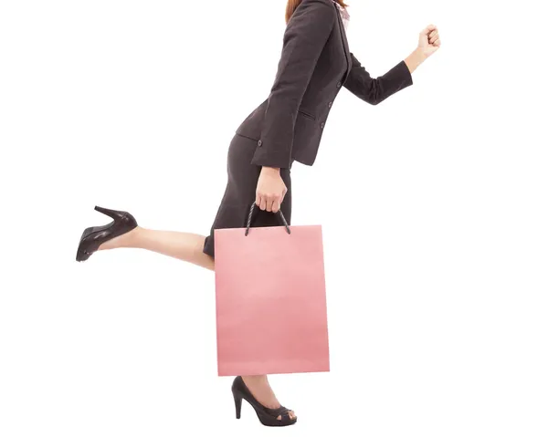 Shopping kvinna med rosa shopping väska — Stockfoto
