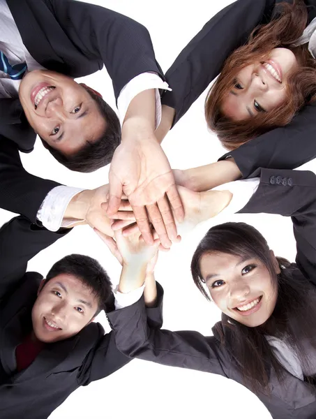 Asiatique jeune entreprise joignant leurs mains — Photo