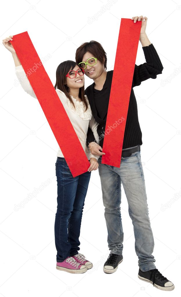Happy Chinese new year. Young Asian couple holding blank spring festival couplets
