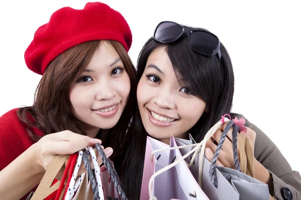 Dos hermanas de compras de belleza aisladas sobre fondo blanco — Foto de Stock