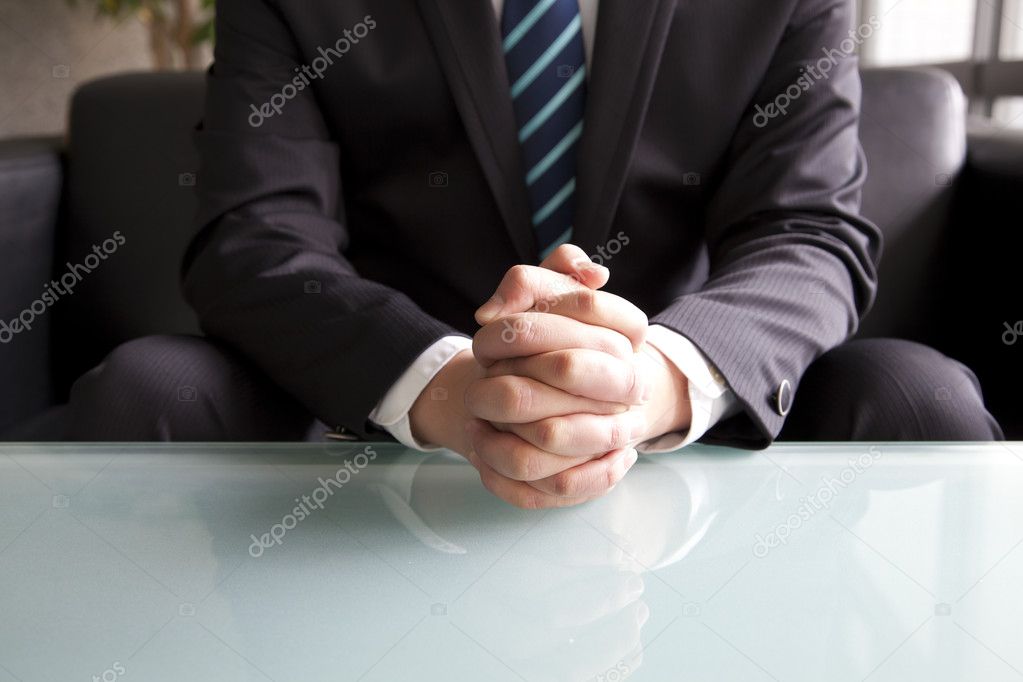 Holding hand of businessman