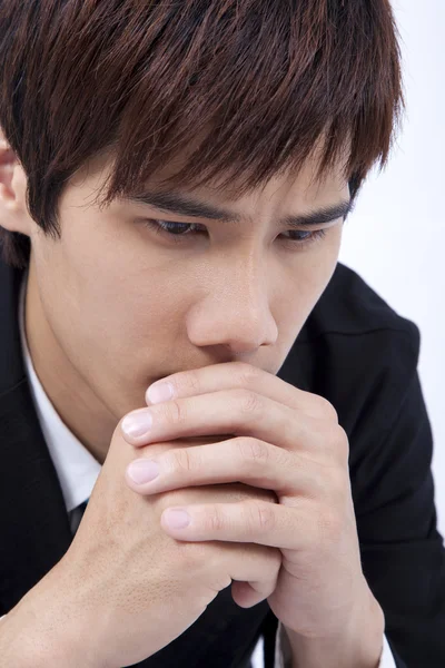 Hombre joven y triste rezando —  Fotos de Stock