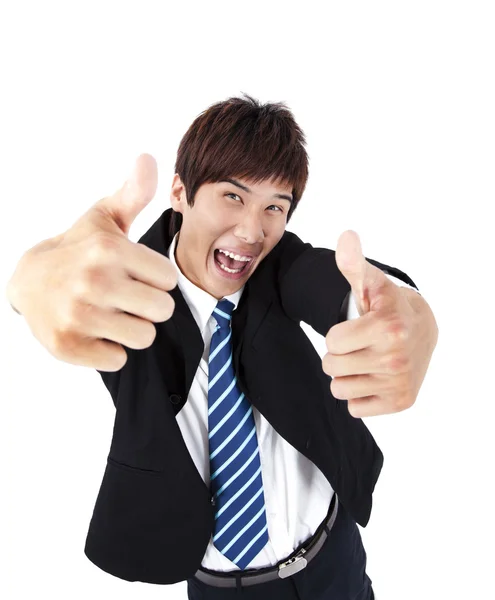 Succesvolle Aziatische jonge zakenman met duim omhoog — Stockfoto