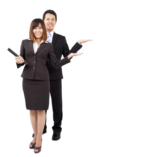 Young smiling businesswoman and businessman. with their hand outstretched a — Stock Photo, Image