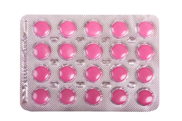 Упаковка розовые таблетки — стоковое фото