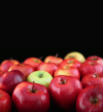 Apples on black background clipart