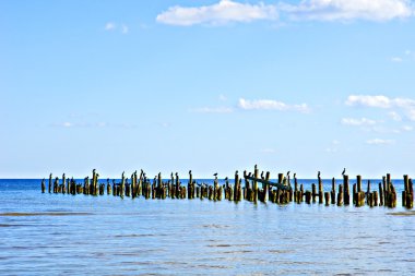 Old pier in Baltic sea. clipart