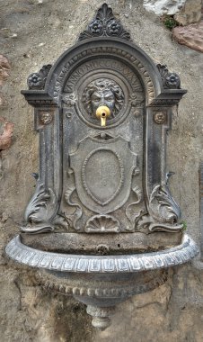 Historical fountain. Assisi. Umbria. clipart