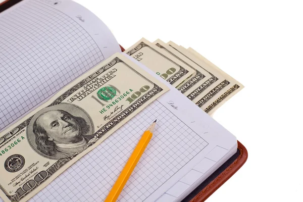 Notebook with money — Stock Photo, Image