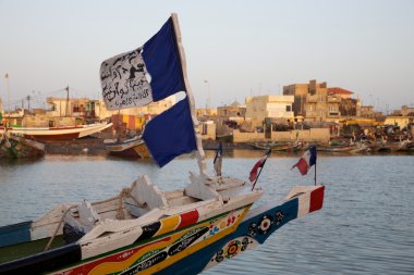 Flags on a fisher boat clipart