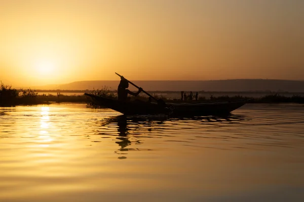 Západ slunce na řece niger — Stock fotografie