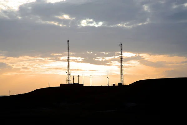 Telekommunikation och solnedgång — Stockfoto