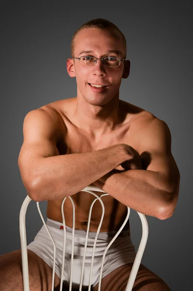 Muscular Man Sitting Chair — Stock Photo, Image