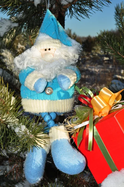 Santa claus a dárek, Vánoce — Stock fotografie