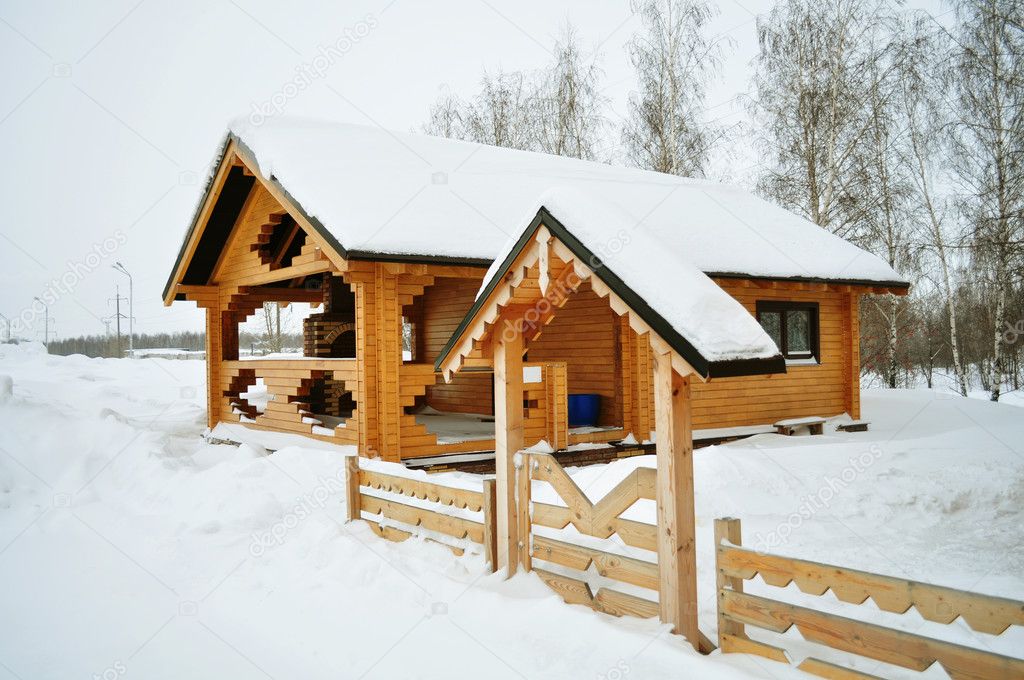 Snow on the house, winter cabin, ski chalet or finnish sauna, residential structure, building exterior, non-urban scene, residential districtstained, wooden fen
