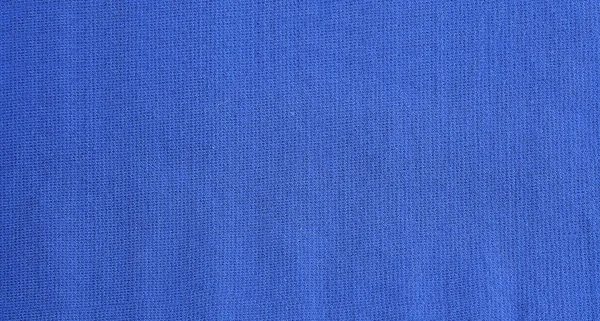 Текстура синей трикотажной ткани как задний план — стоковое фото