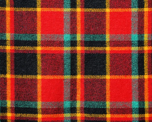 stock image Fabric Texture scottish patterned plaid as a background