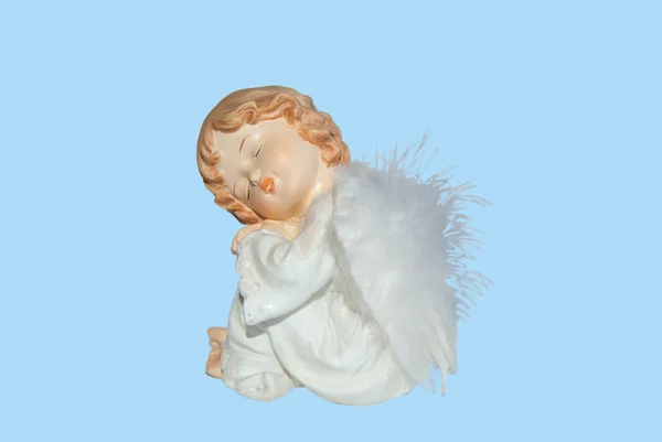 Angel boneca com asas no fundo azul — Fotografia de Stock