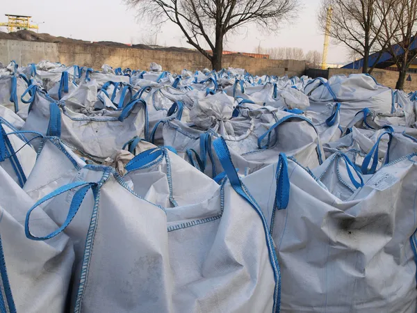 Waste and materials in large bags — Stok fotoğraf