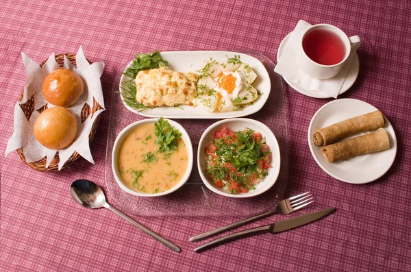 stock image Business lunch from soup, meat, a potato and pancakes