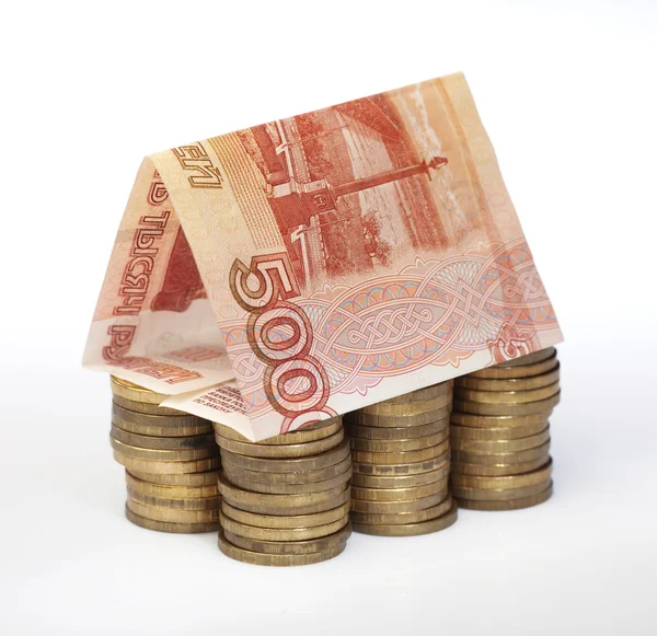 stock image Small small house from Russian money (a coin and a denomination)