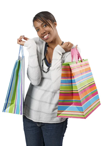 Счастливый покупатель с красочными сумками — стоковое фото