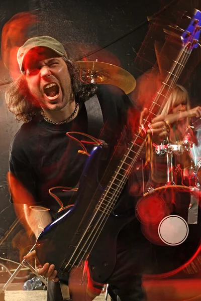 Heavy metal bass guitar player — Stock Photo, Image