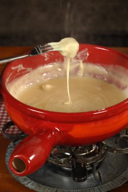 Swiss traditional fondue clipart