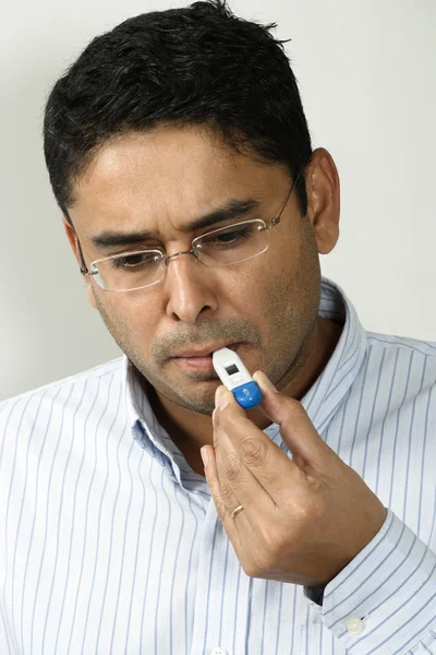 Male His Checking His Temperature Digital Thermometer — Stock Photo, Image