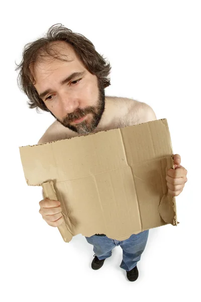 Бездомный держит табличку — стоковое фото