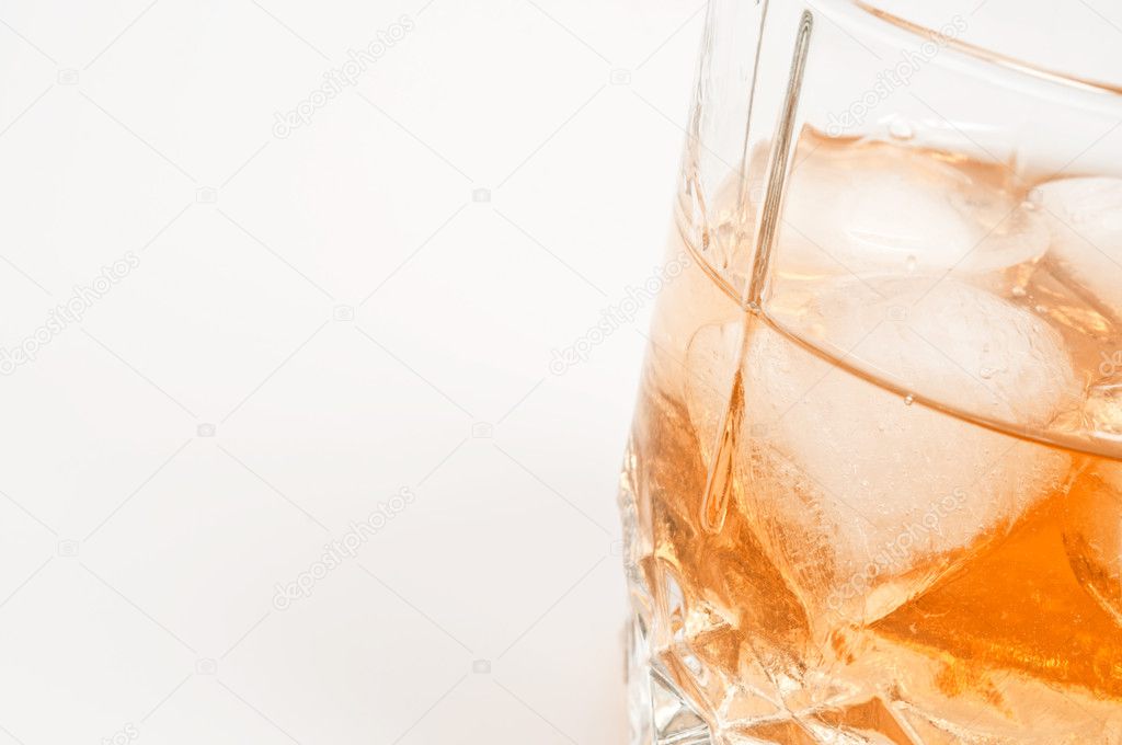 Isolated alcohol glass with ice
