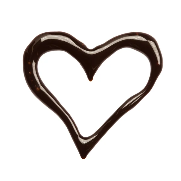 Close-up van chocolade siroop hart op witte achtergrond — Stockfoto