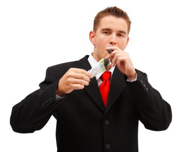 Rich business man lighting cigar clipart