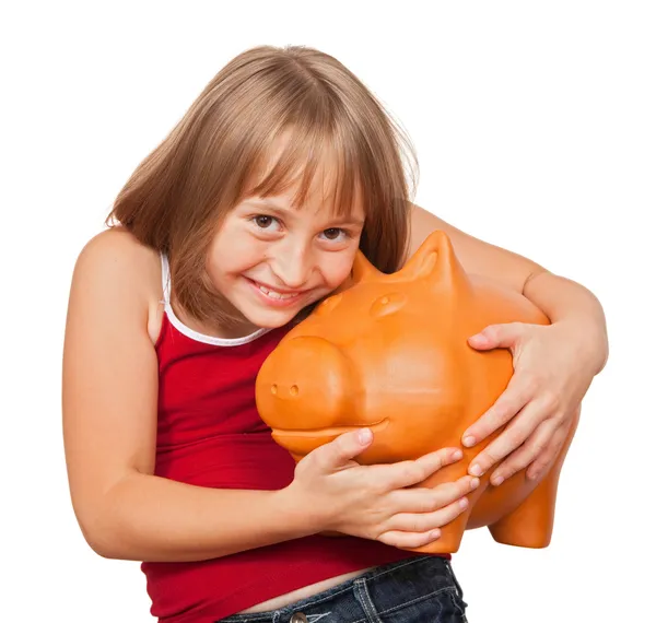 Menina amando seu banco porquinho — Fotografia de Stock